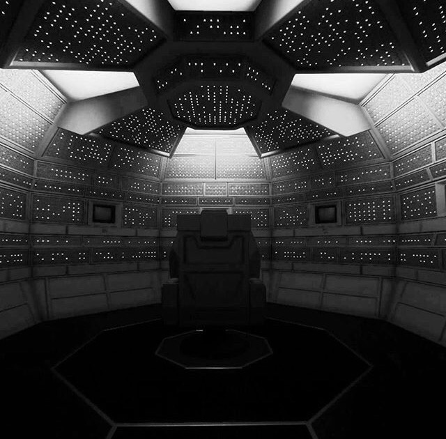 This meme is an image of a dark, empty room with a single chair in the center. The text "I can explain why I'm in a dark room" is overlaid on the image. The implication is that the person is in a dark room because they've finally figured out the answer to a complex problem or puzzle.